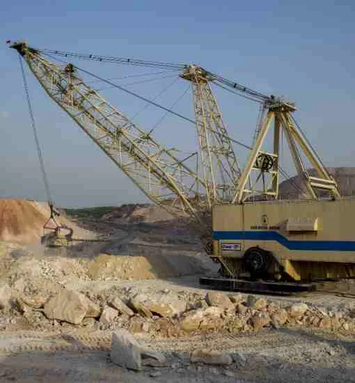 Mining equipment at a quarry, representing investment opportunities in mining